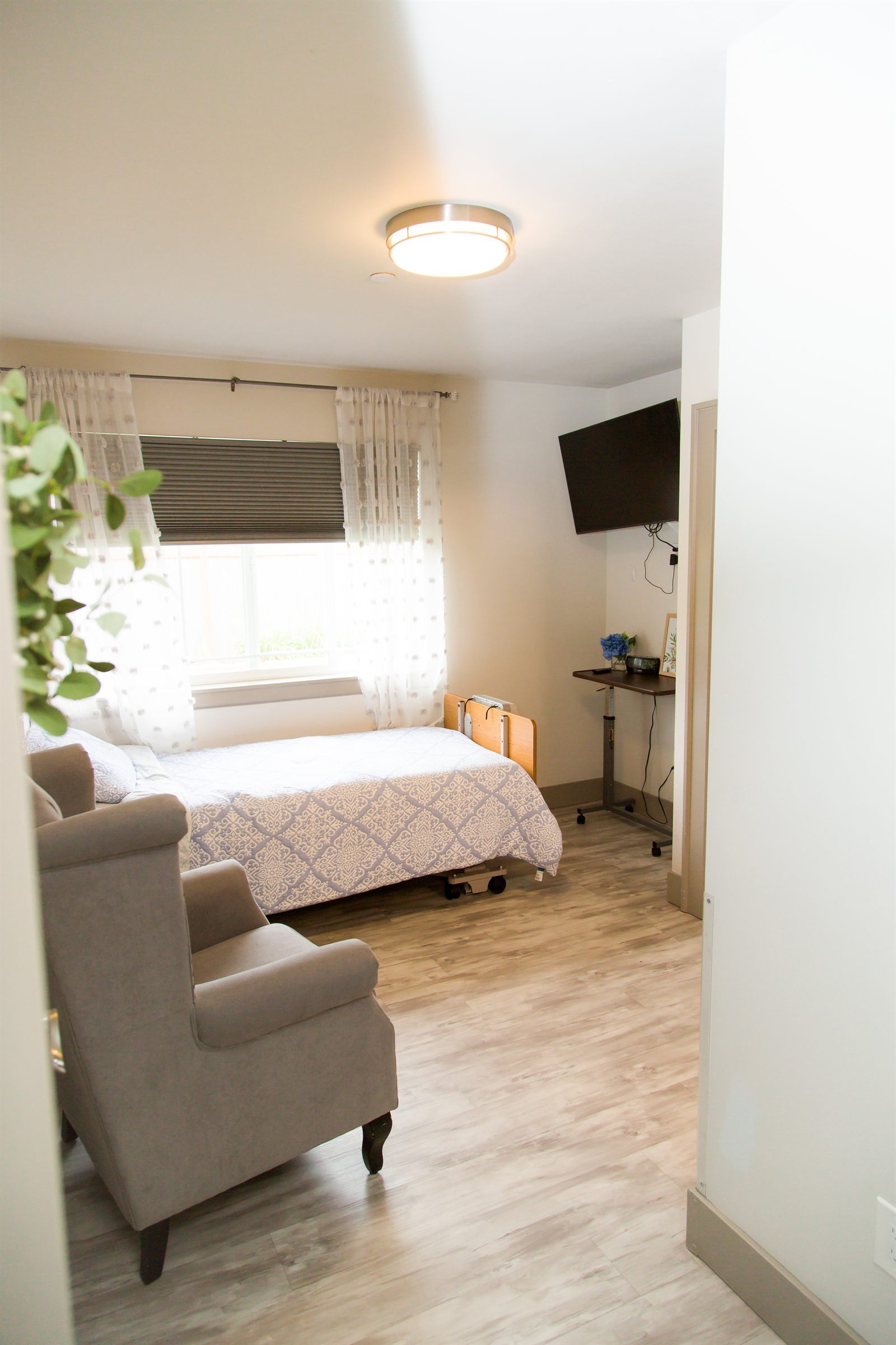 A private bedroom with a television